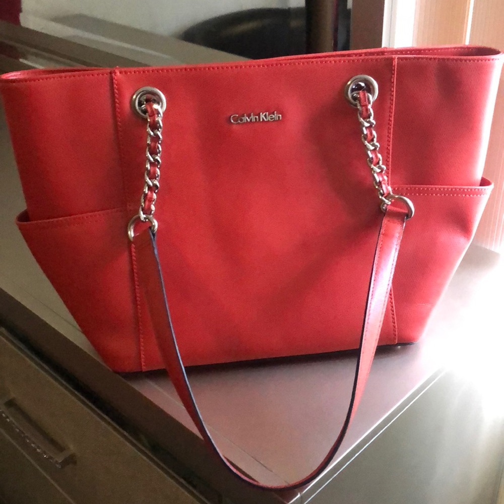 Calvin Klein Orange Tote side pocket hand bag